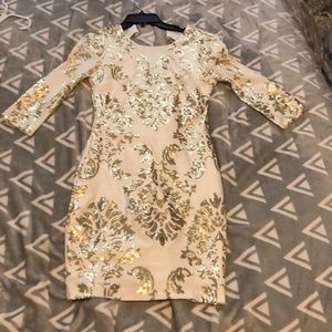 White/ gold tight fitting homecoming dress.